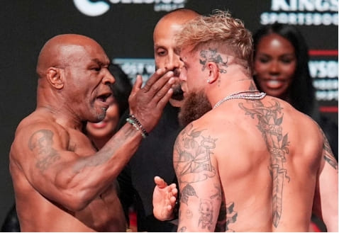 Mike Tyson slaps Jake Paul at the weigh-in before their Texas bout